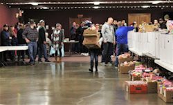 woman carrying boxes